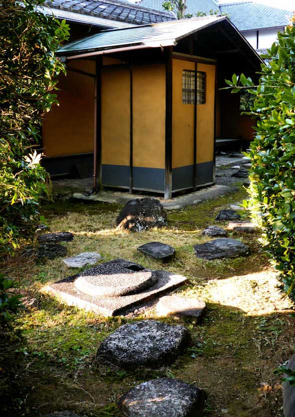 A path leads to one of the tea houses in the gardens of Shitennoji Temple.