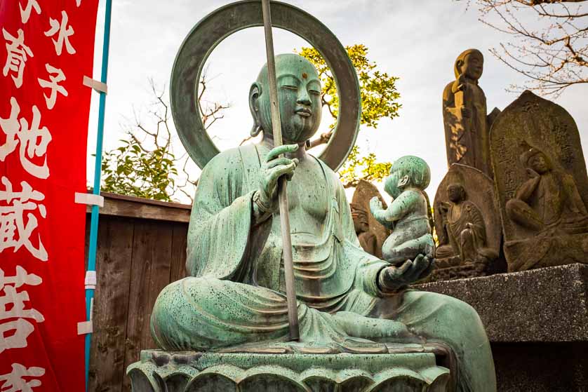 Buddha and Child, Kanonji Temple, Yanaka, Tokyo.