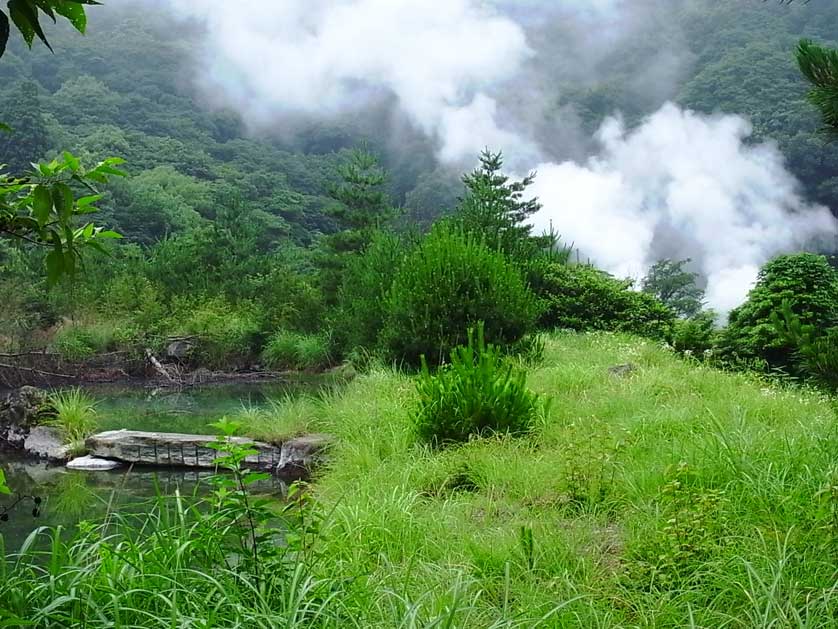 Steam rising from the Onsen Hoyo Land mud baths, Beppu, Oita.
