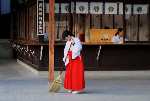 Cleaning the shrine grounds and working in the shrine shop are two of the main activities for contemporary Miko.