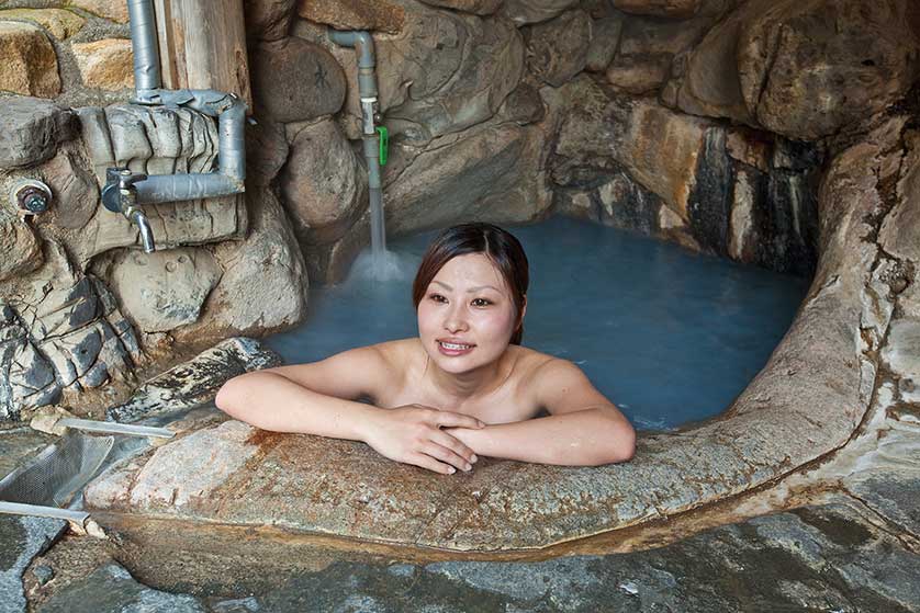 Enjoying a hot spring onsen.