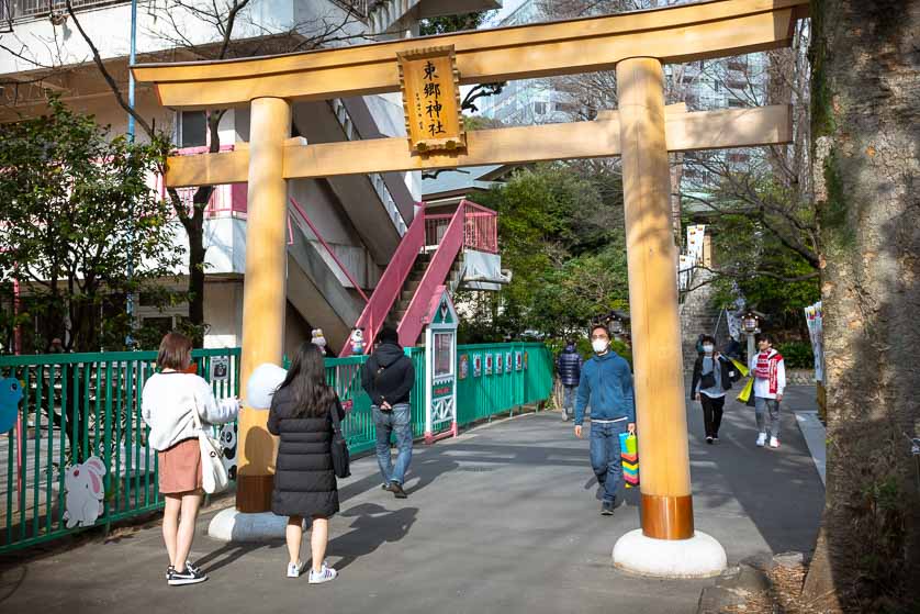Torii arch at Takeshita-dori entrance to Togo Jinja Shrine, Harajuku, Tokyo.