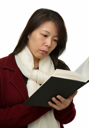 Woman Studying for Japanese Language Proficiency Test