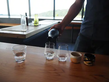 Iwa 5 being poured for a tasting in "The Doma"