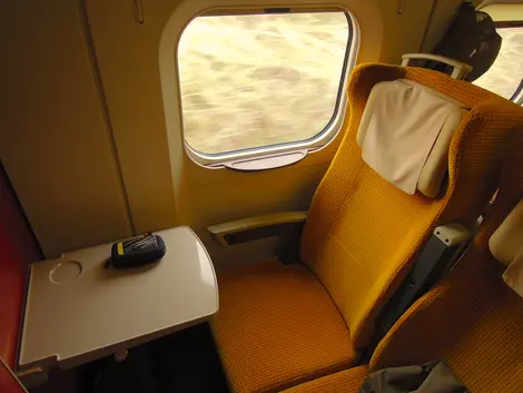 Akita Shinkansen inside yellow seat