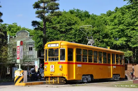 A tram travels the 1950s architectural Edo-Tokyo Garden, inviting back in time.