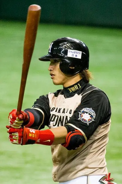 Le joueur Dai-Kang Yang de l'équipe Hokkaido Nippon Ham Fighters, gagnante de la ligue pacifique en 2016