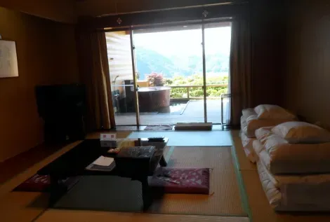 Un hôtel Onsen avec bain privé à Ohito
