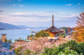 The sacred island of Miyajima and its famous torii with feet in water, worth a visit off Hiroshima in Japan